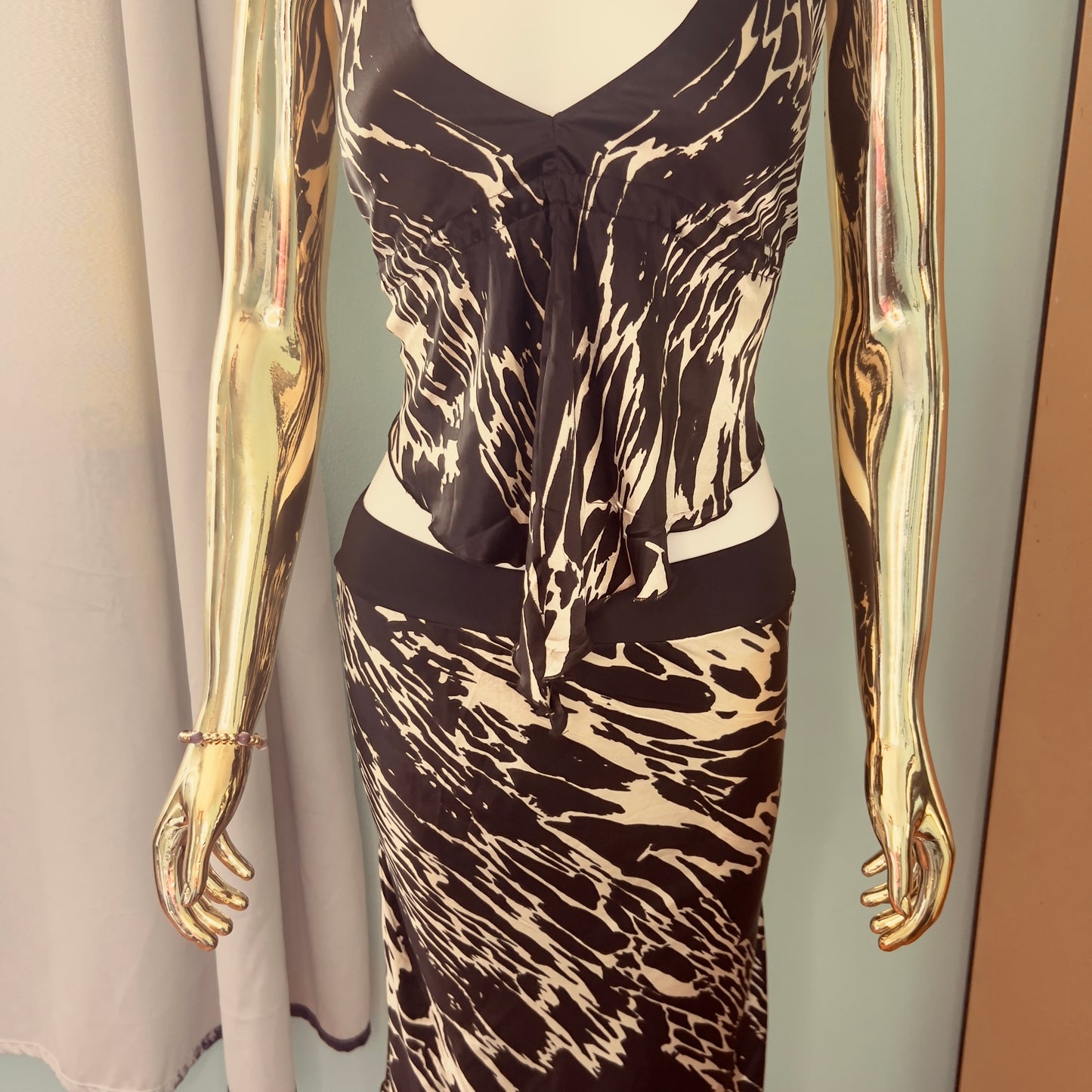 Black and white tank top with matching knee length skirt set